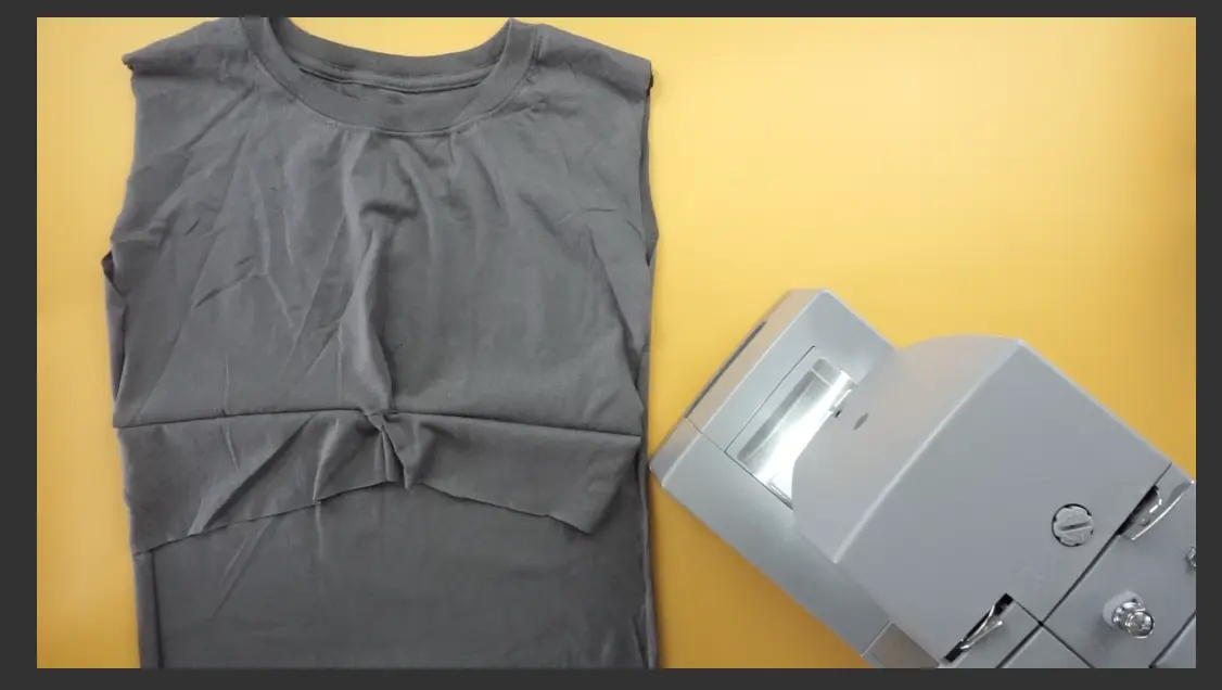 Trim the bottom of the front twist to give more shape to the t-shirt dress.
