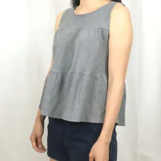 Sideview of sleeveless top from upcycle skirt