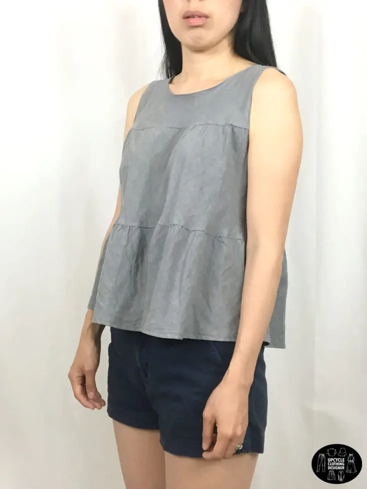 Sideview of sleeveless top from upcycle skirt