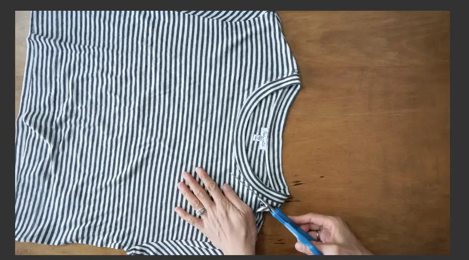 Draw the V-neckline with fabric chalk then cut along the line