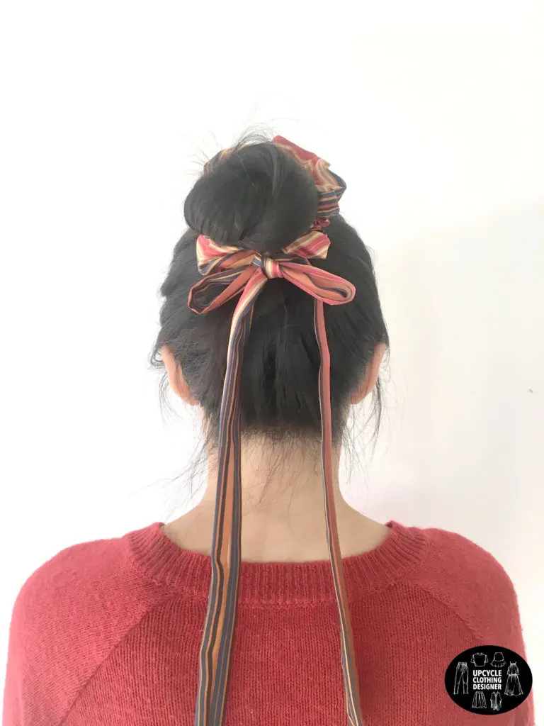 DIY no sew hair bow scrunchie in a topknot hairstyle