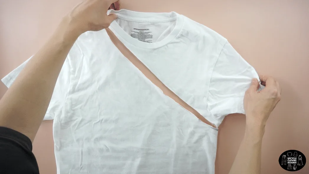 Draw a line connecting both points and cut to make an asymmetrical neckline.