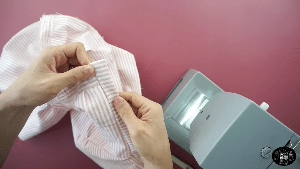 Fold the waistband over the waistline, pin to secure and topstitch to finish the new waistband.