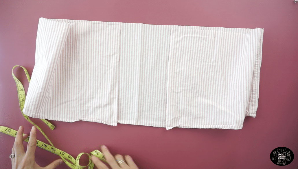 Measure the width of the ruffled piece.