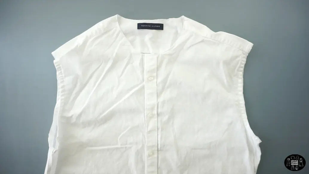 Cut off the neckband, collar and sleeves from the original men's shirt