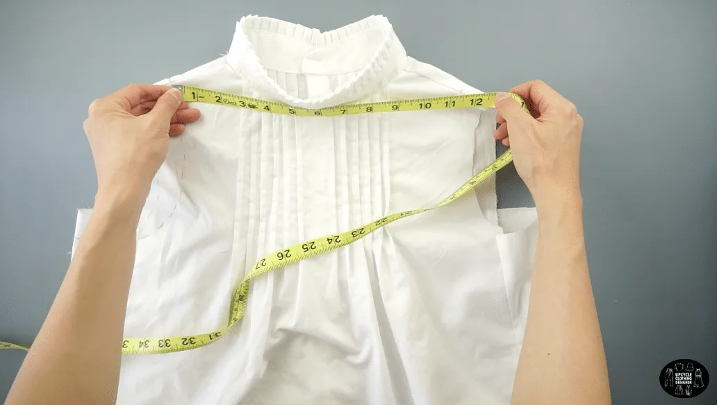 Measure the width of the shoulders to mark the placement for the shoulders and armhole opening.