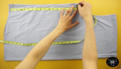 Measure 17” up from the hemline.  Draw a straight line across and cut.