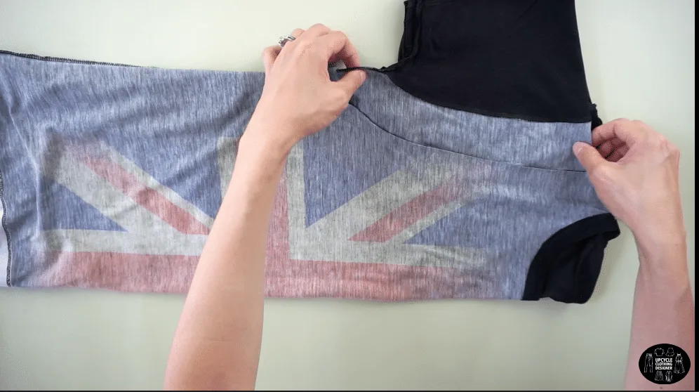 Draw a smooth curved line to make a new armhole for the tank top.