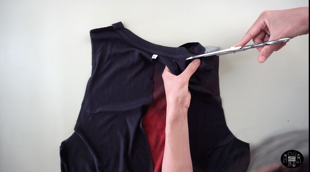 Cut along the shoulder seam and along the neckband to the center back opening.