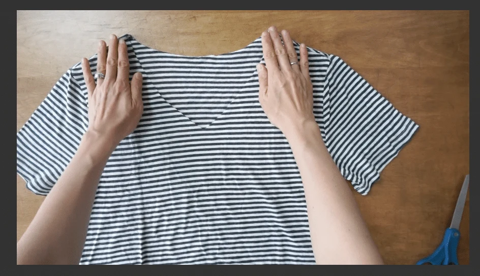 Cut along the diagonal lines to make a V-neck shirt