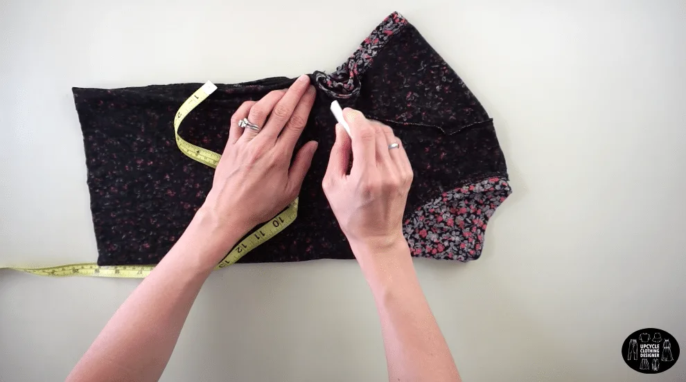 Draw a smooth curved line to the point just underneath the armhole opening.