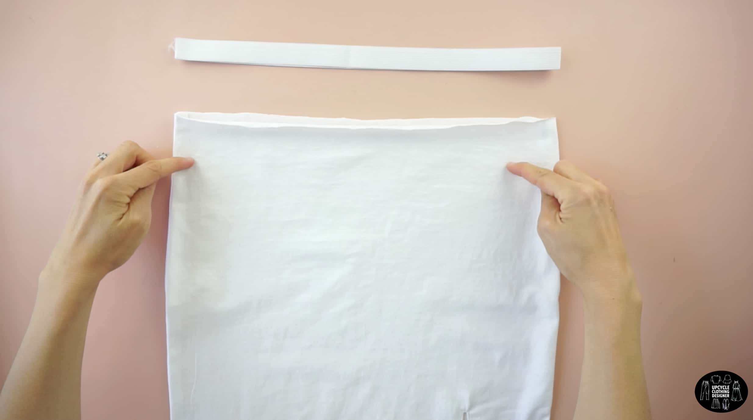 Cut a piece of ¾” elastic band that is 28” long for the waistband
