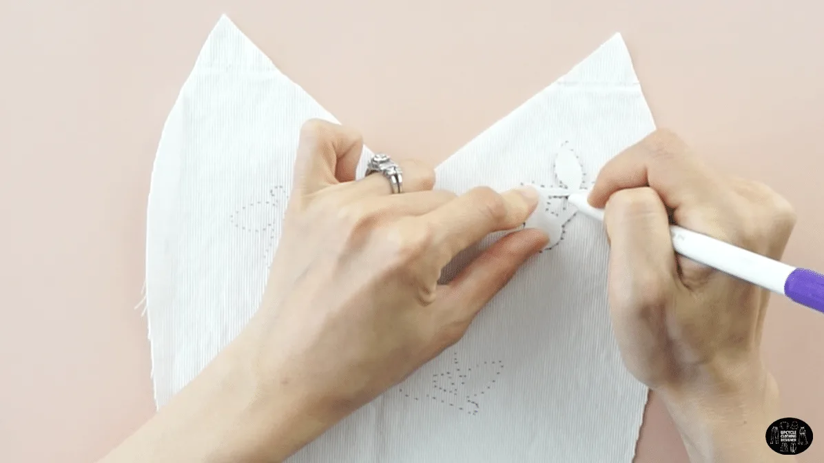 Use a disappearing pen to trace the cherry pattern onto the front of the dress.