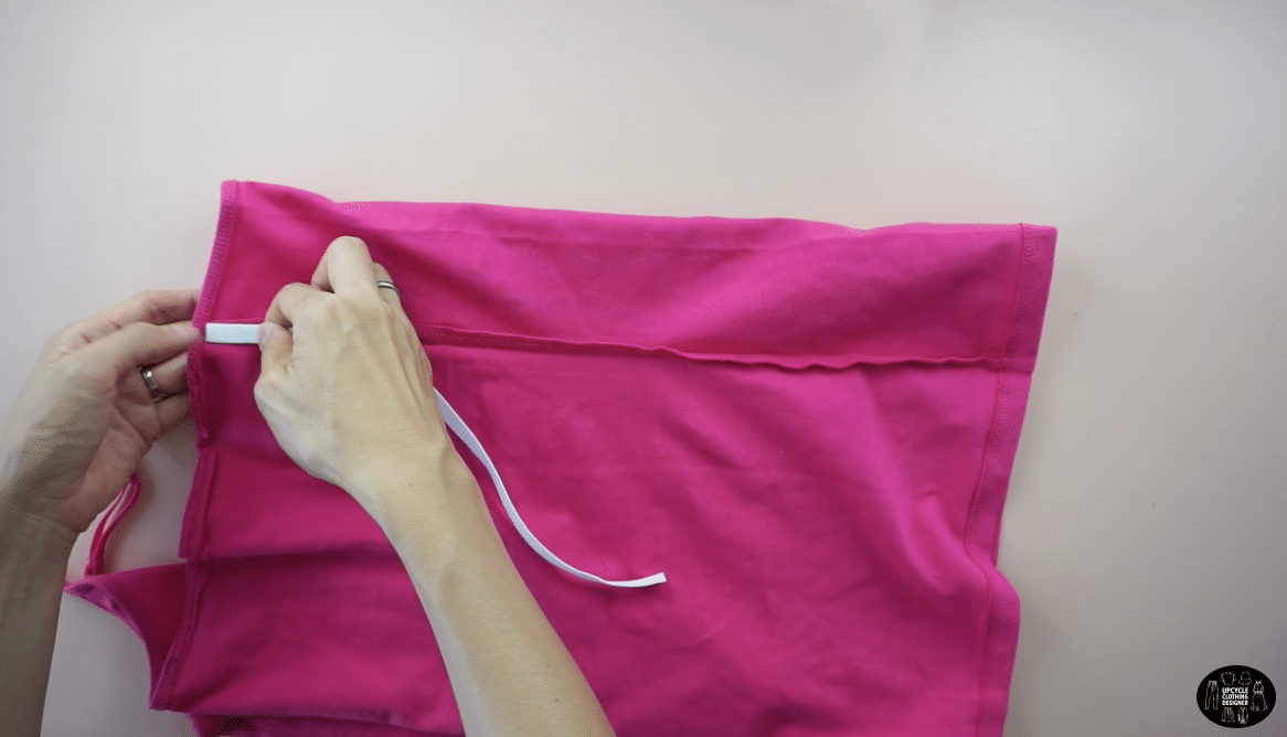 Pin the elastic along the side seam underneath the armhole.