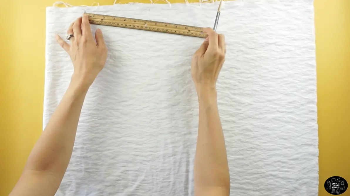 To measure the sleeve length, drop the shoulder 1”, and measure 14” away from the center.