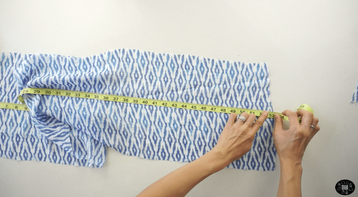 To make the top tier of the dress, cut an 11” x 52” piece of fabric.