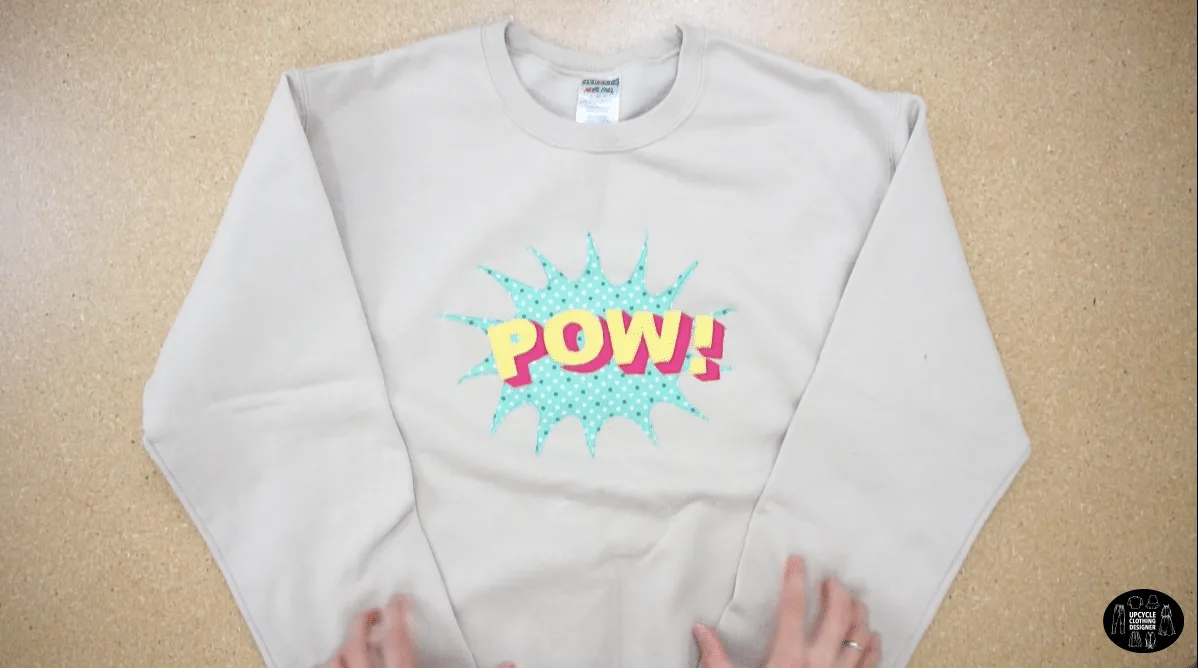 POW applique patchwork on the front of a sweatshirt