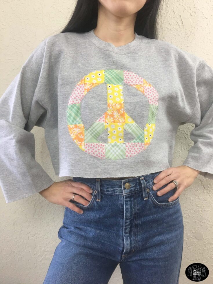 Patchwork peace sign cropped sweatshirt front