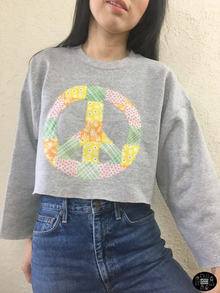 Patchwork peace sign cropped sweatshirt front view