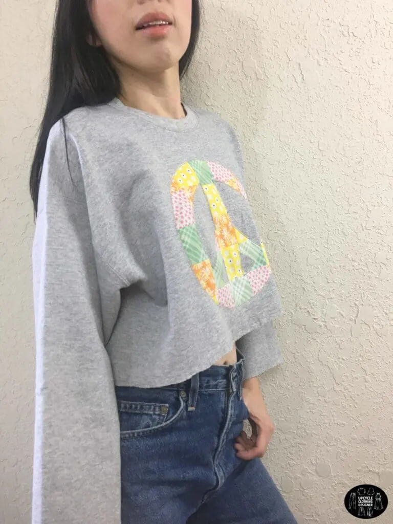 Patchwork peace sign cropped sweatshirt side