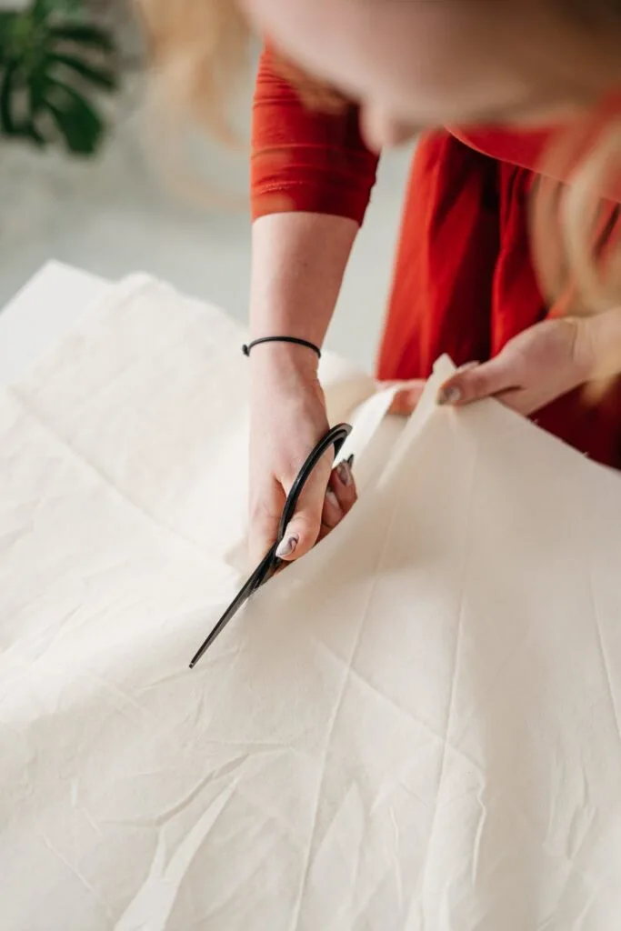 cutting fabric with fabric scissors