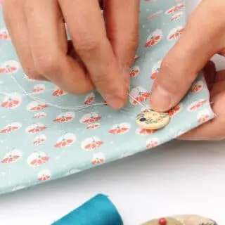 hand sewing 2 holes button