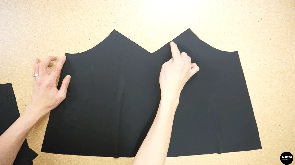 Use overlock stitch to secure the neckline of the front piece