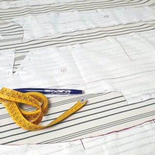 pinned sewing pattern on fabric