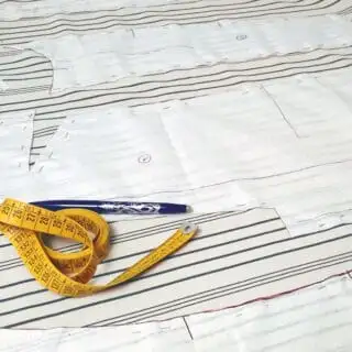 pinned sewing pattern on fabric