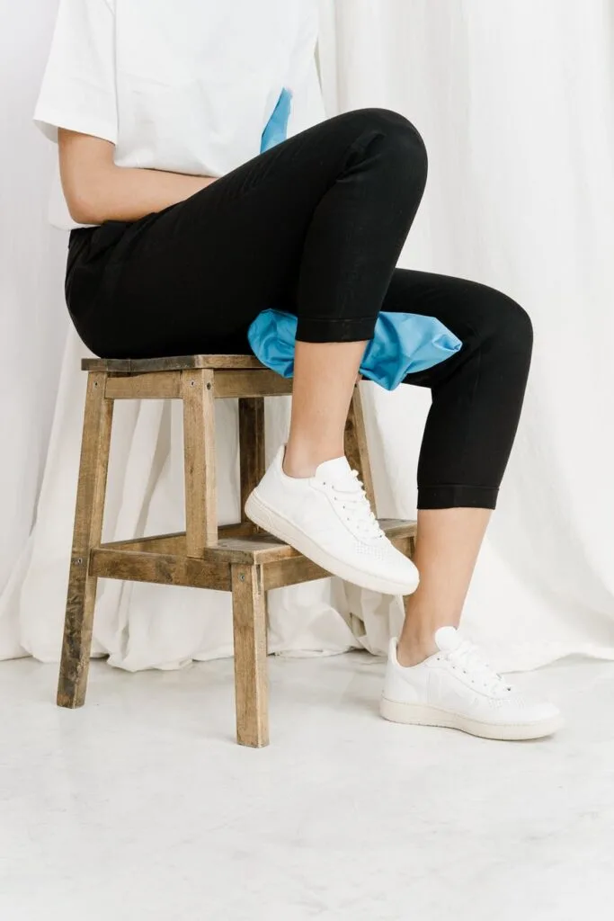 black cropped leggings on a stool