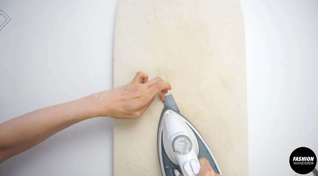 Use ¼” double sided iron-on tape to fold all four sides clean.