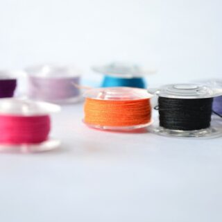 bobbins wound with different colors of thread