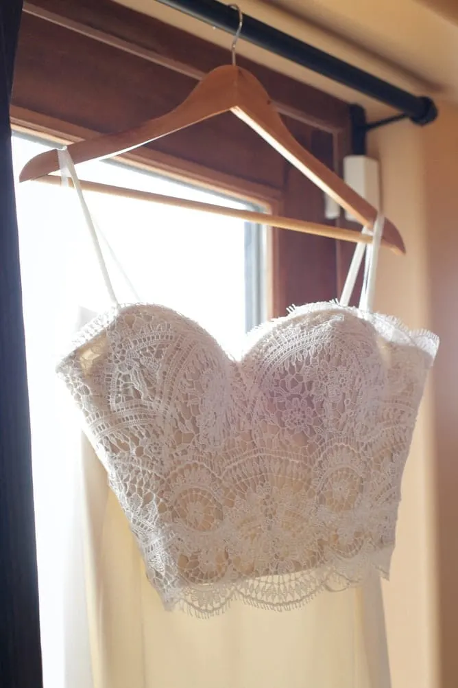 lace crochet crop top on a hanger