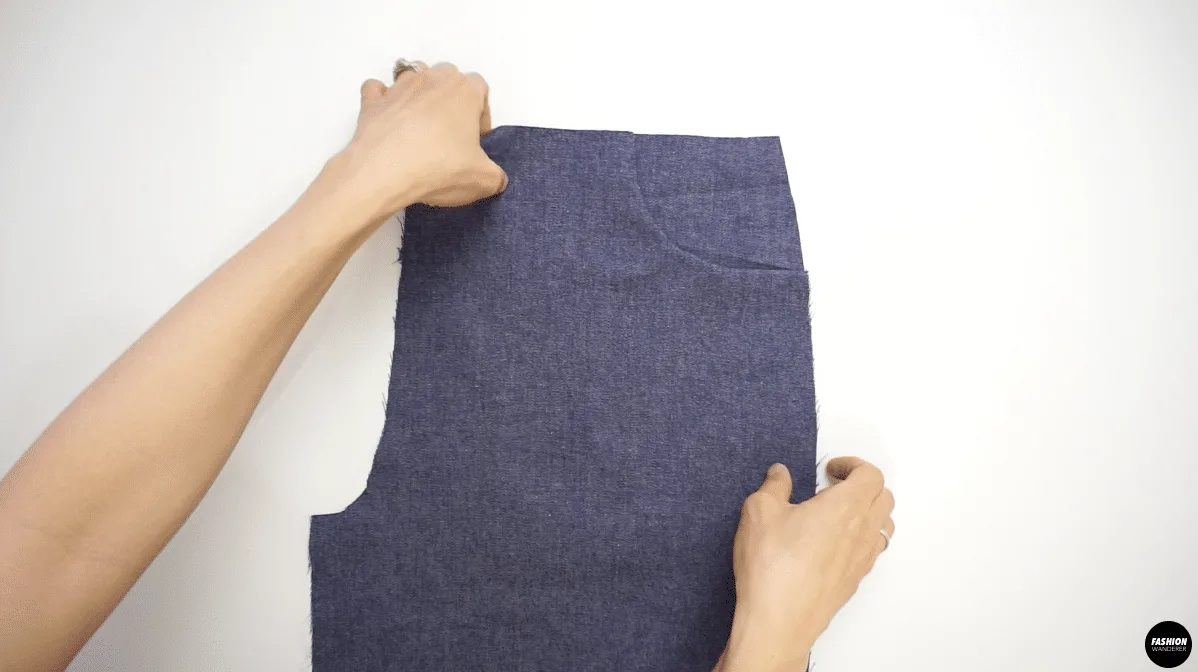 Topstitch ¼” along the pocket bag and pocket facing to the pants to prevent from moving around.