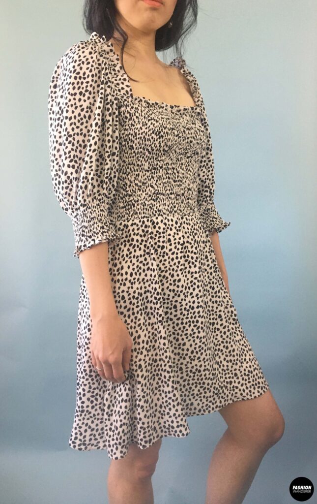 Elania smocking mini dress sideview Elania smocking mini dress sideview