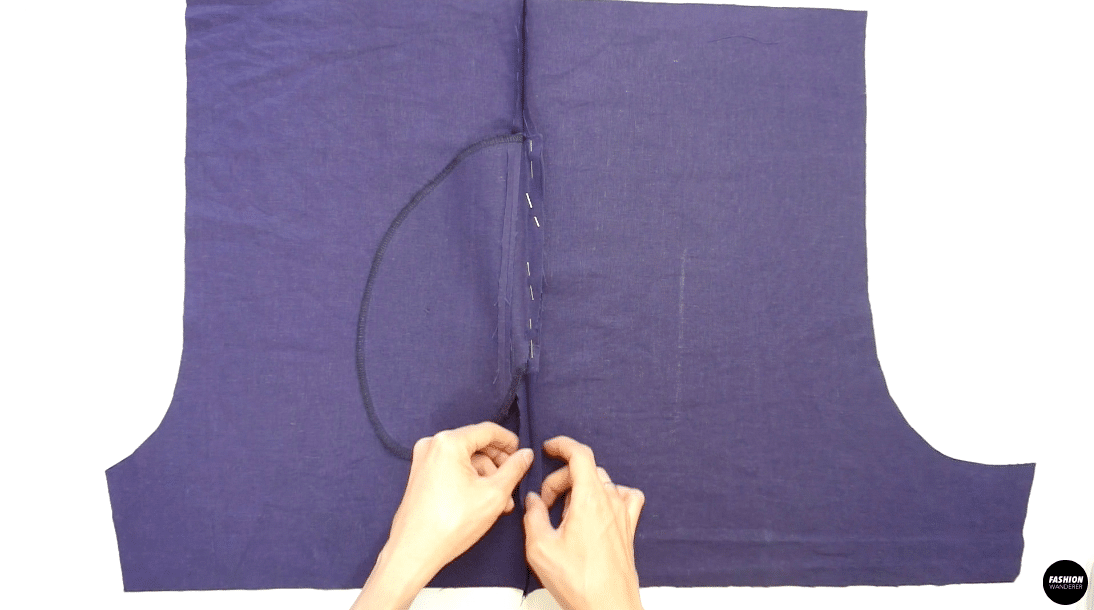 To insert inseam pocket to shorts, lay Front and Back Shorts open with the wrong side up. Slide the pocket opening seam allowance matching with side seam allowance and pin. Do the same on the opposite side, sew ⅜” straight stitch and finish the seam allowances on both sides with overlock stitch.