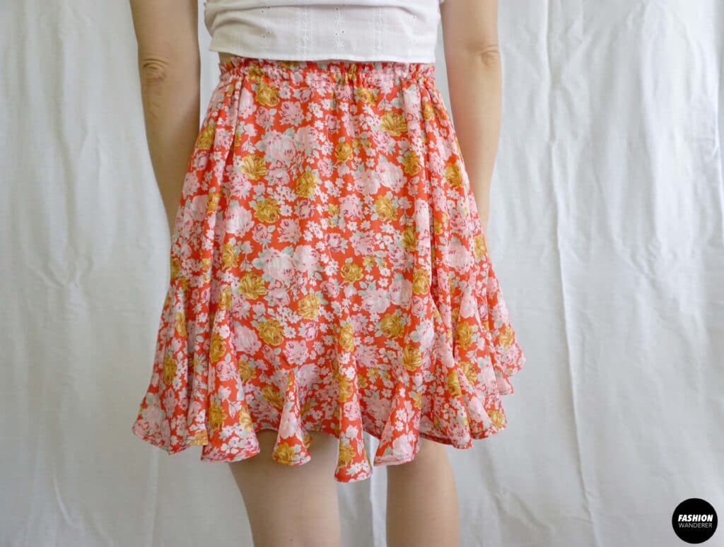 Stella tie waist godet mini skirt back view Stella tie waist godet mini skirt back view