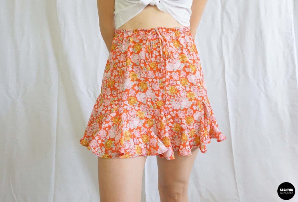 Stella tie waist godet mini skirt front view Stella tie waist godet mini skirt front view