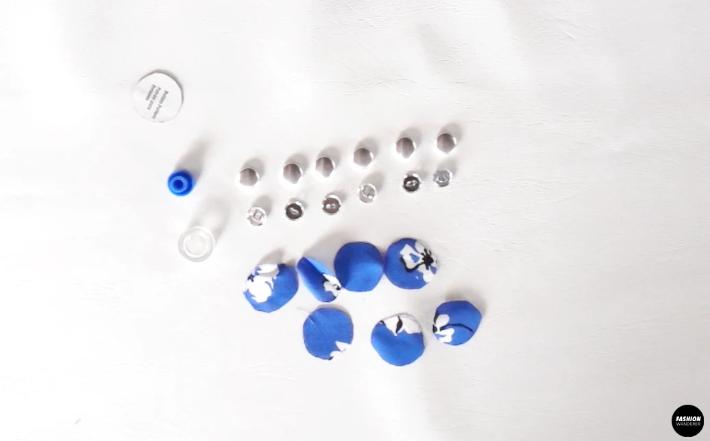 Create 6 pieces of button covers using the self fabric