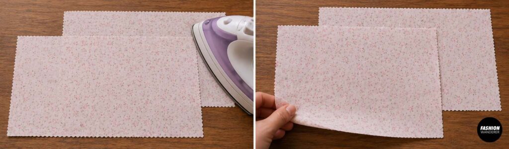 Pale pink floral cotton lining pieces being pressed flat and prepared on a wooden sewing table for assembling the inside of a handmade patchwork zipper pouch.
