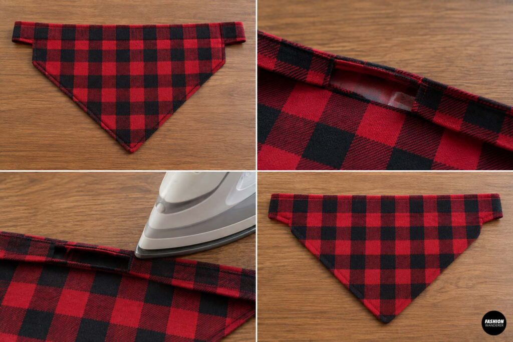 Finished red and black buffalo plaid reversible dog bandana being pressed with an iron, showing crisp edges, neat topstitching, and finished tie ends.