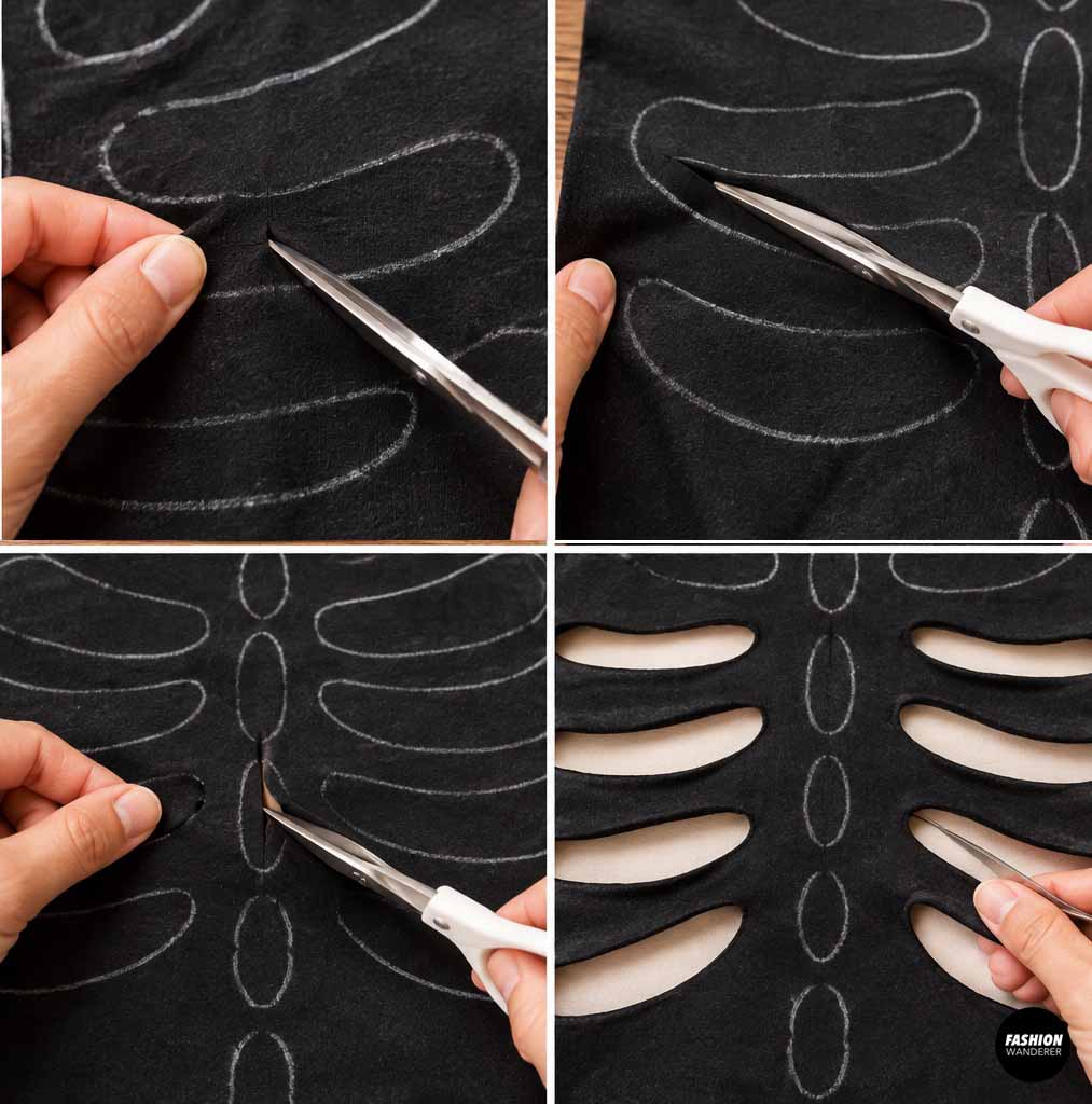 Close-up of scissors carefully cutting along chalk-drawn rib and spine shapes on a black T-shirt to create skeleton cutouts.